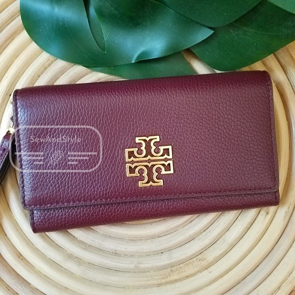 Tory Burch Handbags - IMPERIAL GARNET TORY BURCH SMART PHONE WALLET WRISTLET PURPLE PLUM BRAND NEW